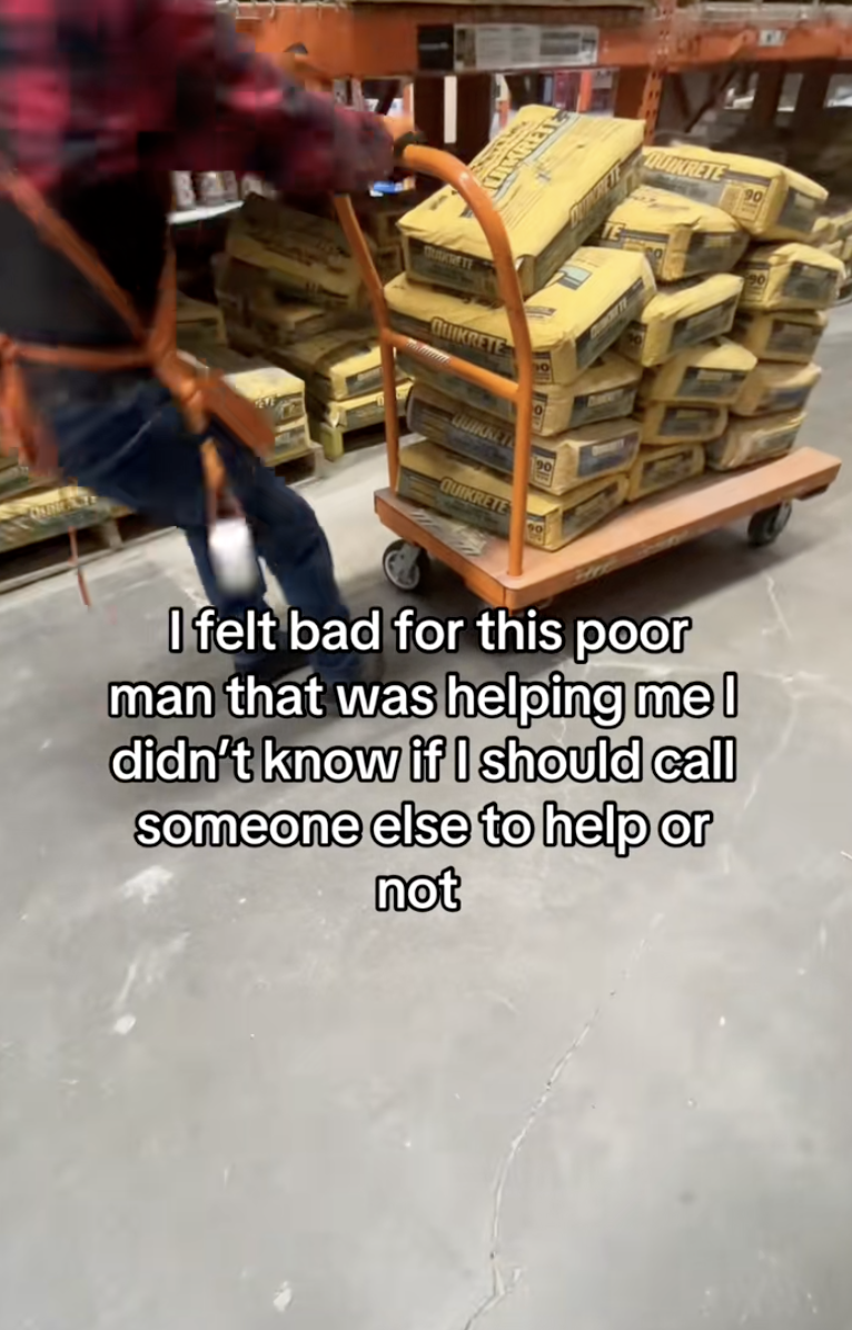 man trying to pull a cart